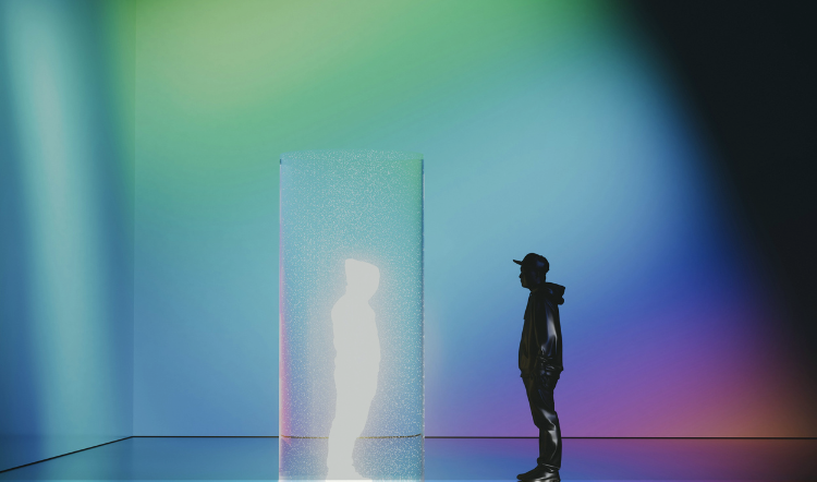 Person standing in an immersive XR environment with glowing light panels, representing virtual space visualization for AV design planning