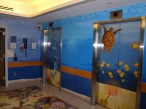 Elevator with backdrop of turtles