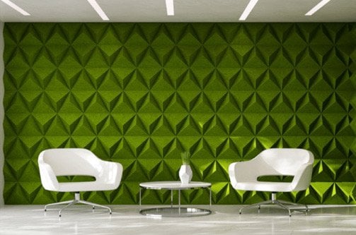 A green room with white chairs