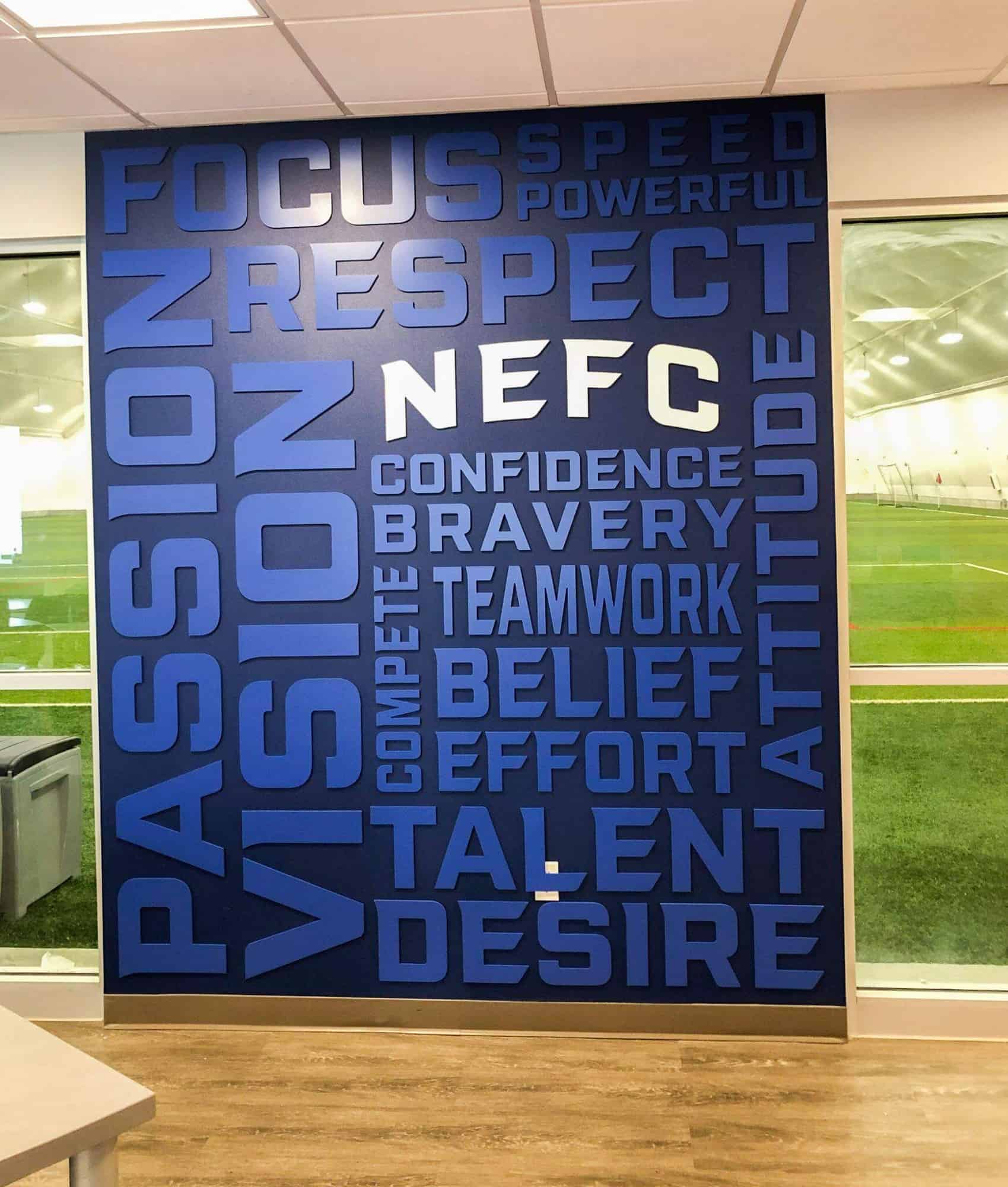 NEFC’s office has a unique word branding wall that draws the eye.